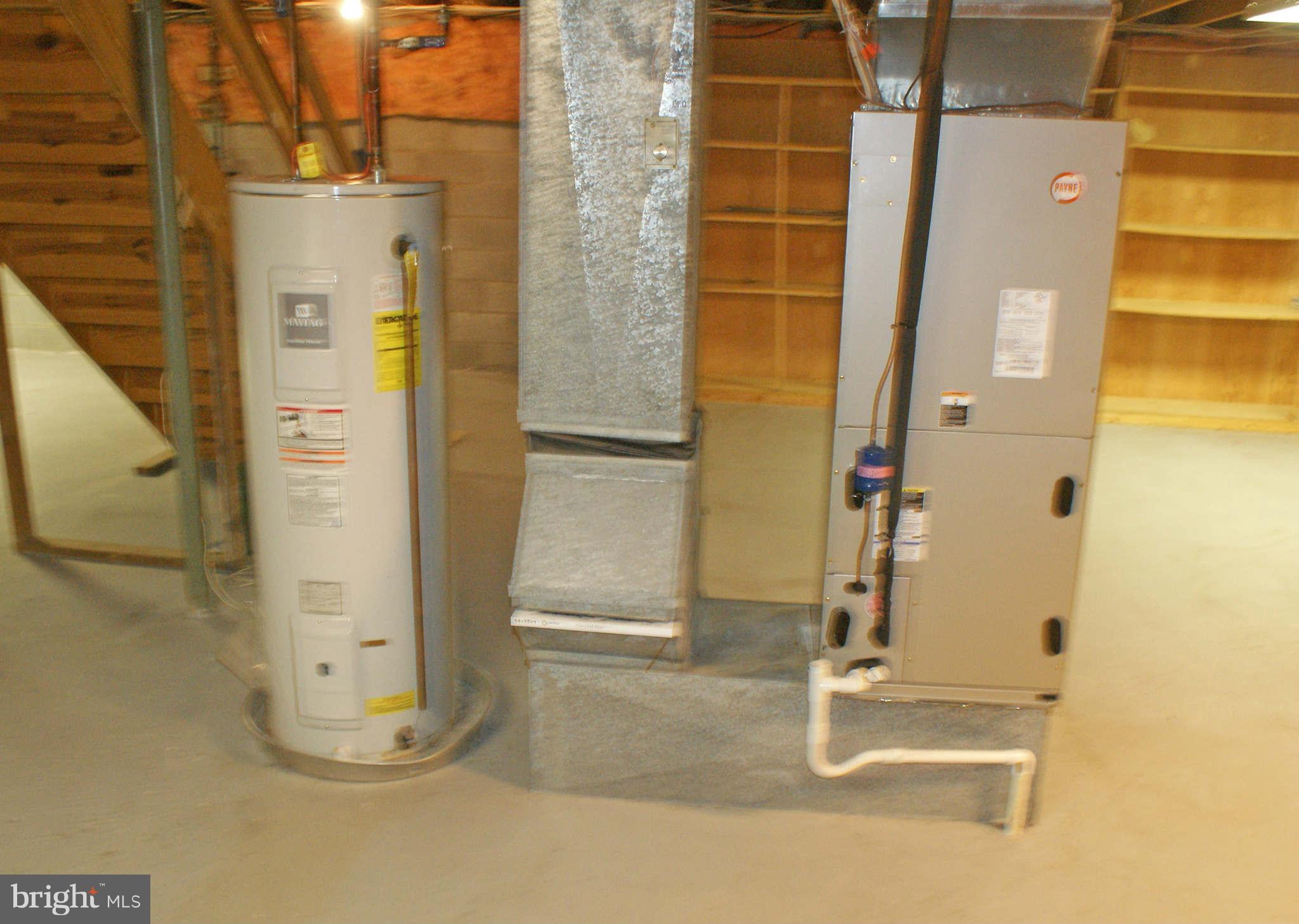 16099 Dorset Road Laurel, MD 20707 - Photo 21 of 25 Basement, Water Heater and Heat Pump