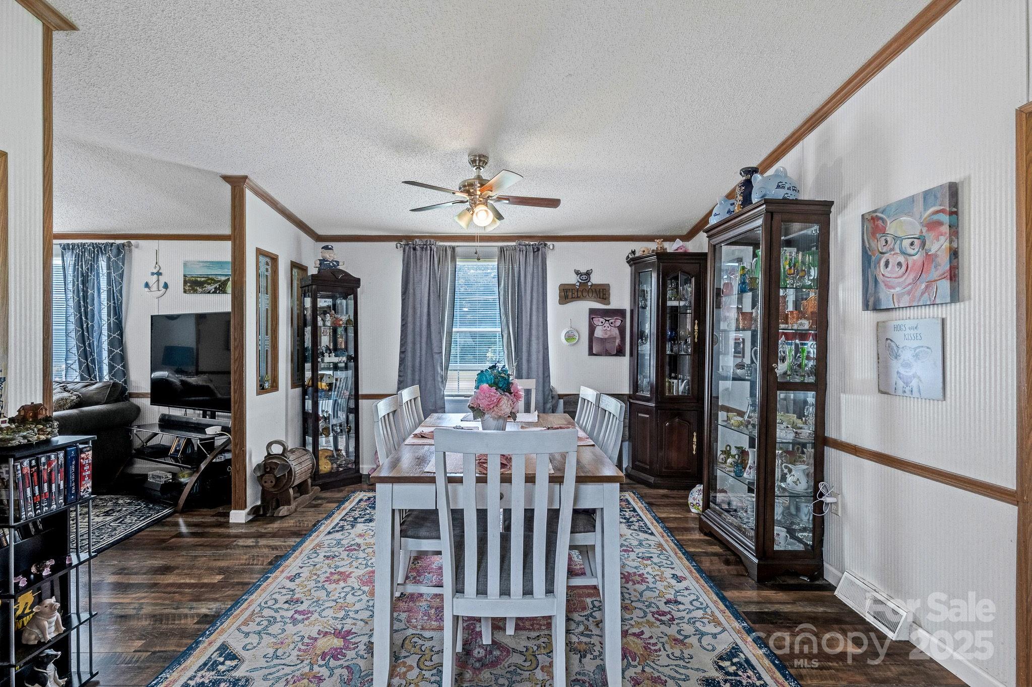 1107 Richard Road Salisbury, NC 28147 - Photo 11 of 35 a view of a dining room with furniture window and wooden floor