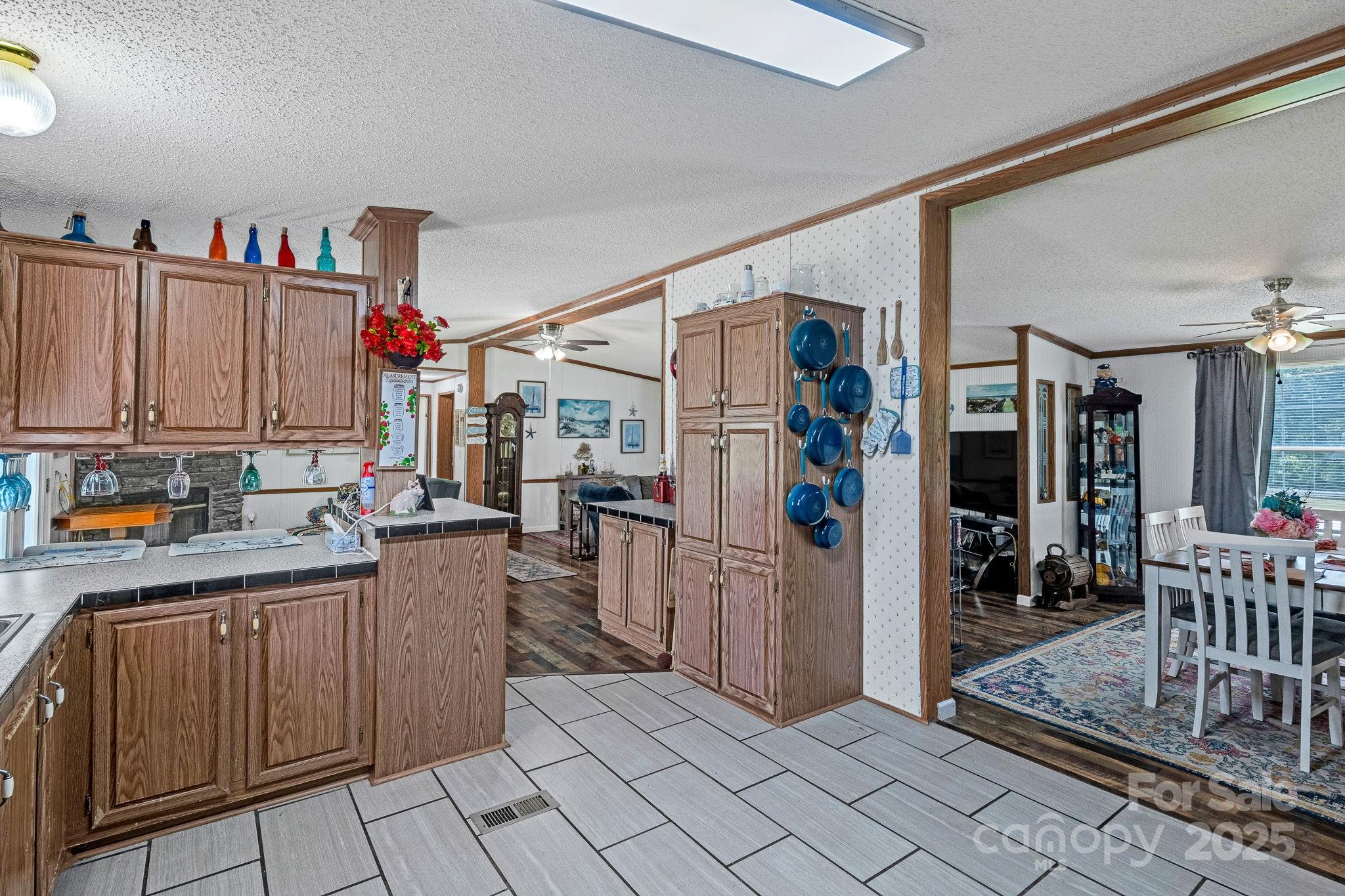 1107 Richard Road Salisbury, NC 28147 - Photo 13 of 35 a view of a kitchen with fridge and workspace