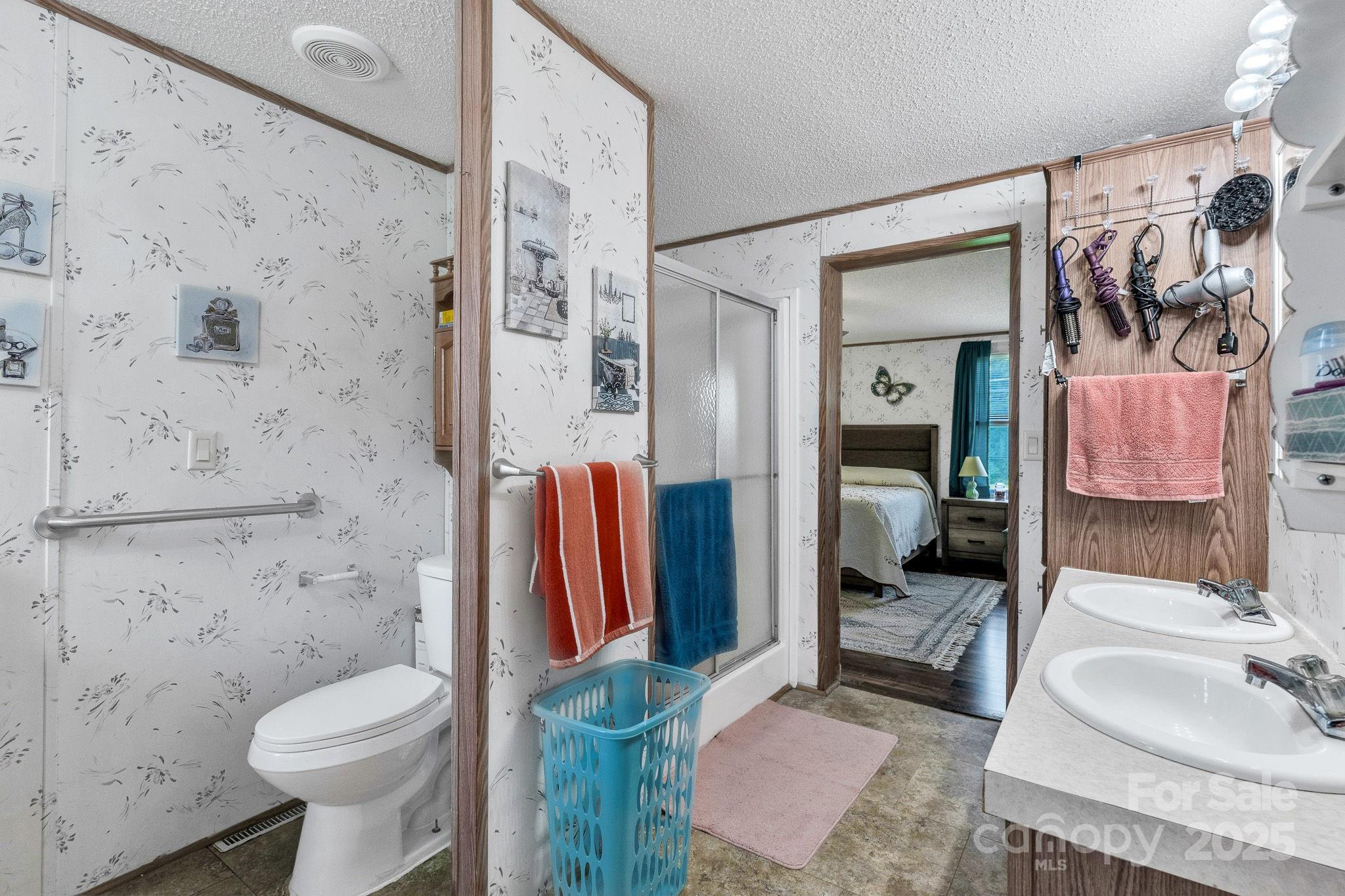 1107 Richard Road Salisbury, NC 28147 - Photo 20 of 35 a bathroom with a sink toilet and shower