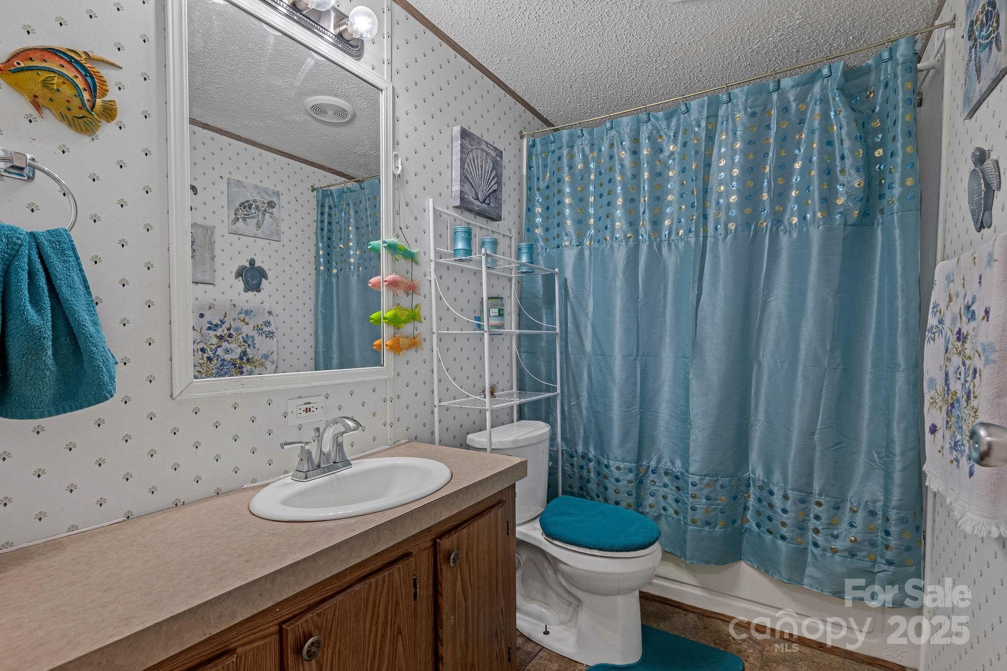 1107 Richard Road Salisbury, NC 28147 - Photo 26 of 35 a bathroom with a granite countertop sink and a mirror