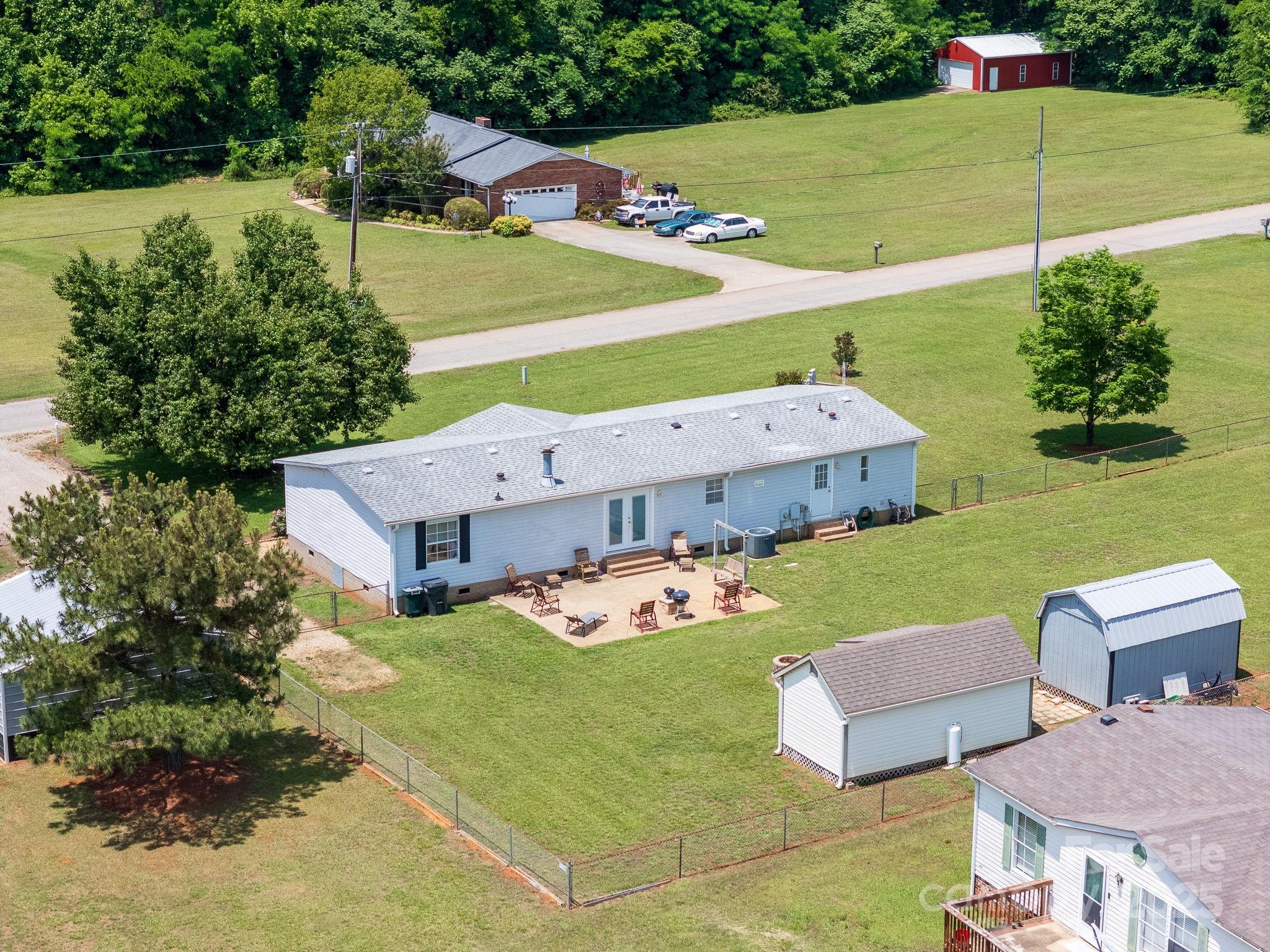 1107 Richard Road Salisbury, NC 28147 - Photo 32 of 35 an aerial view of a house with yard swimming pool and outdoor seating