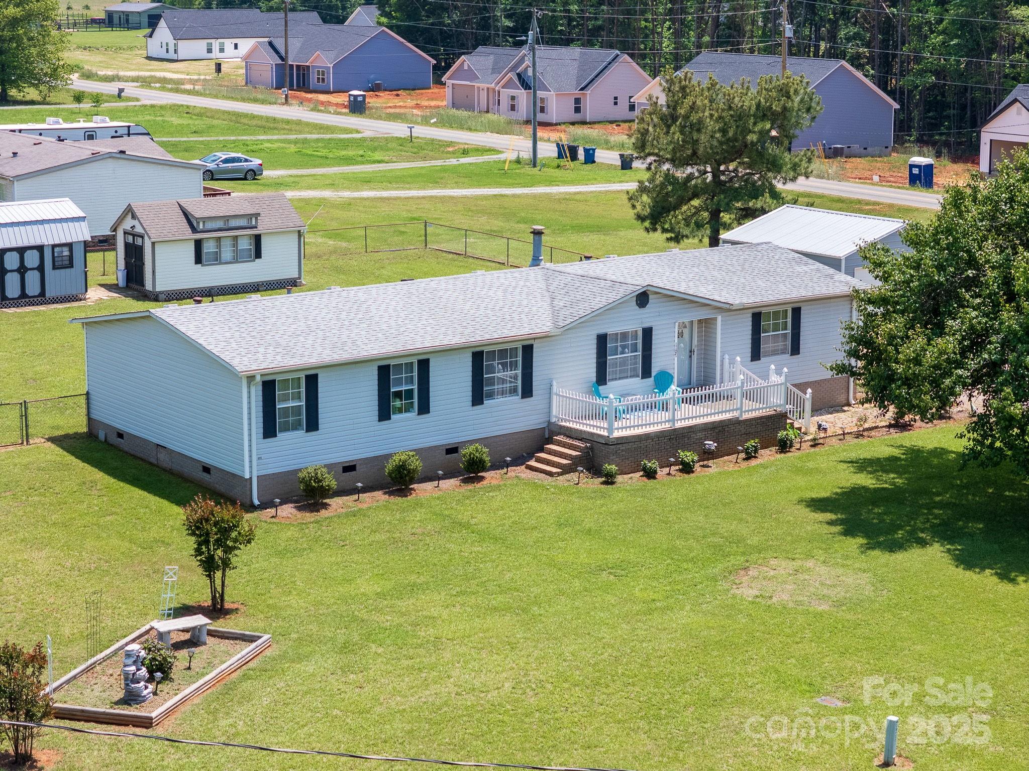 1107 Richard Road Salisbury, NC 28147 - Photo 5 of 35 a aerial view of a house with swimming pool garden and patio