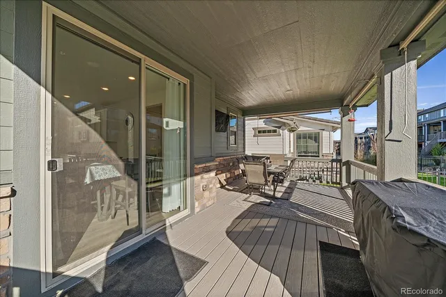 a view of house with swimming pool yard and outdoor seating