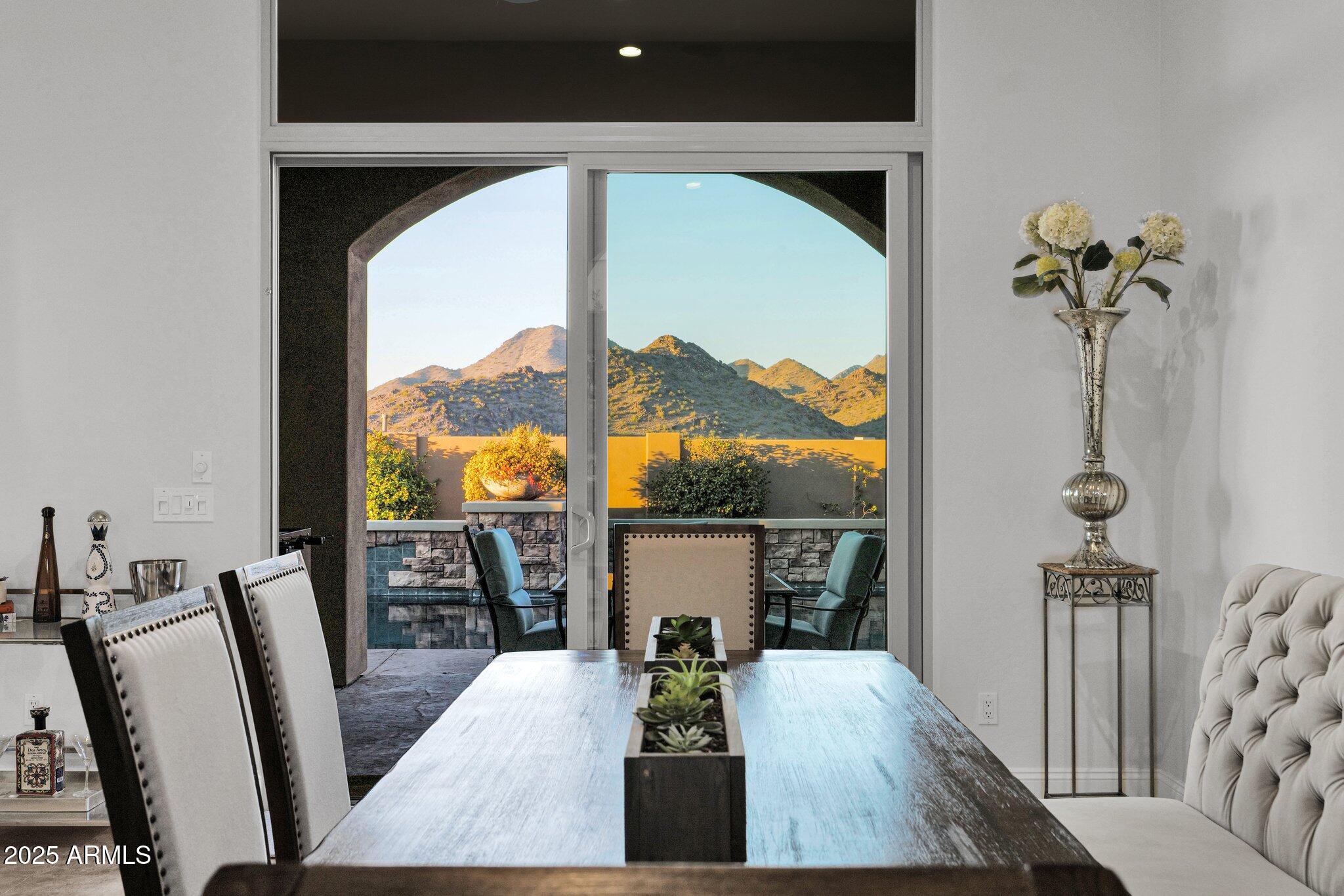 11348 East Greenway Road Scottsdale, AZ 85255 - Photo 8 of 36 Formal dining with mountain views