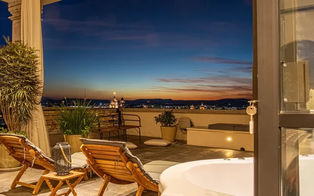 a view of a balcony with ocean view
