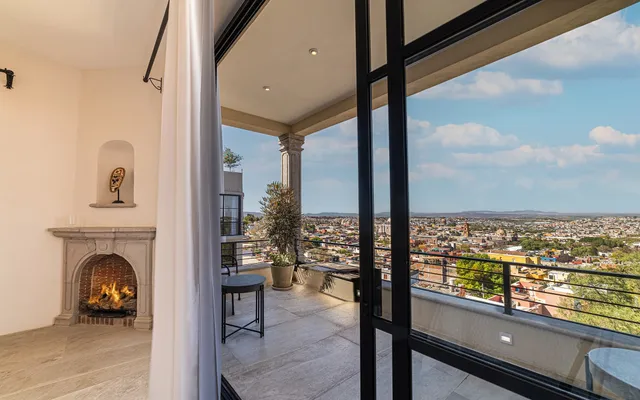 a view of a balcony with city view