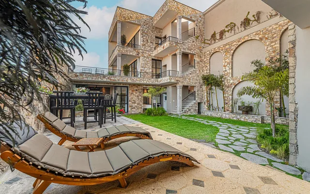 a view of a building with a swimming pool