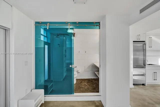 a bathroom with a sink toilet and tub