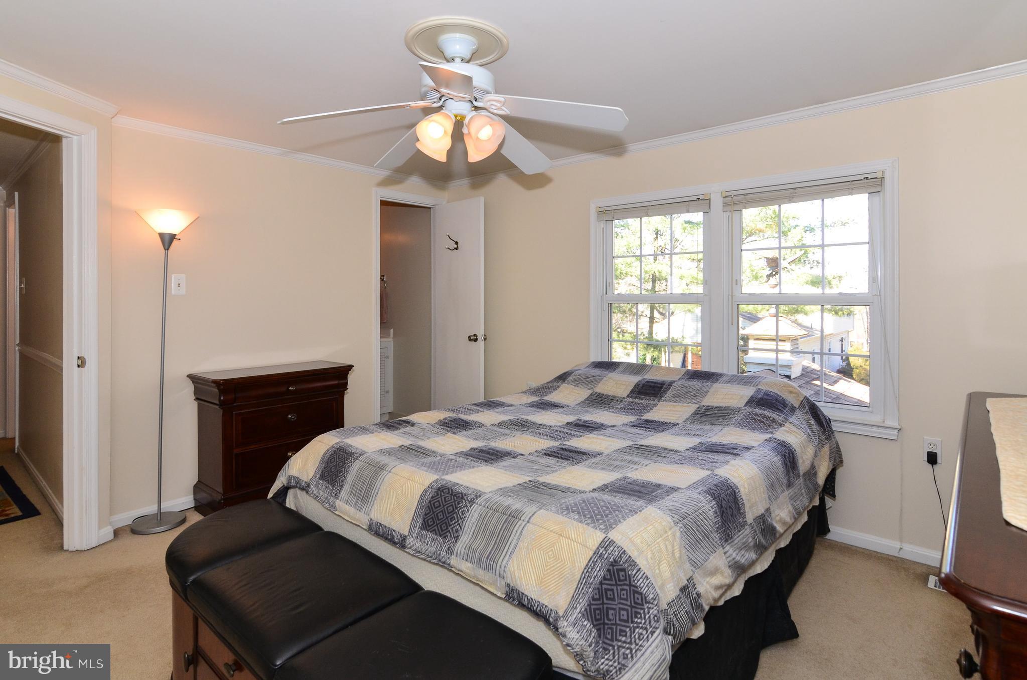 3008 Seminole Road Woodbridge, VA 22192 - Photo 16 of 30 Bedroom with walk-in closet and ceiling fan