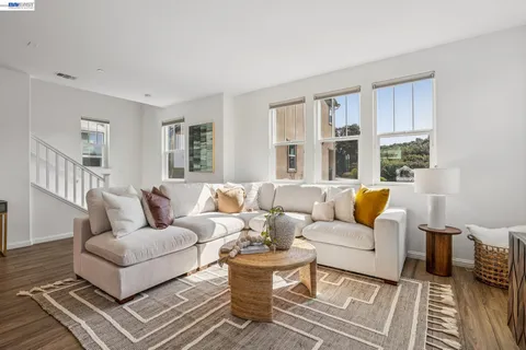 a living room with furniture and a couch