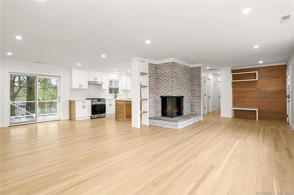 a view of a livingroom with a fireplace