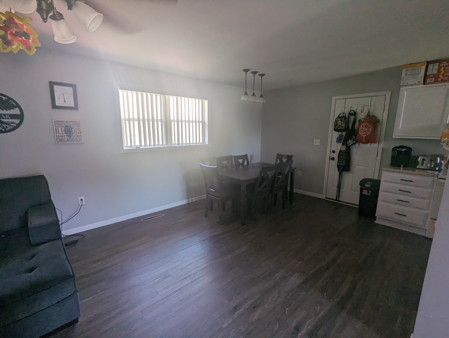 402 East South Mahomet Road Mahomet, IL 61853 - Photo 13 of 21 a living room with furniture and a window