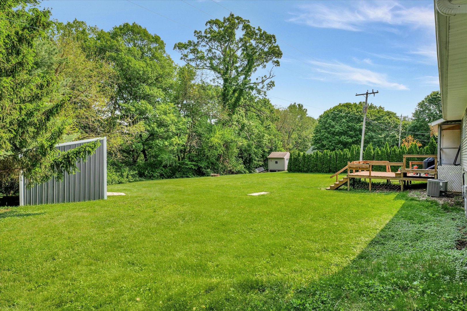 402 East South Mahomet Road Mahomet, IL 61853 - Photo 3 of 21 a view of a garden with a slide