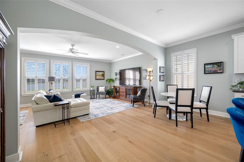 19709 Long Lake Ranch Boulevard Lutz, FL 33558 - Photo 13 of 59 a living room with furniture wooden floor and a window