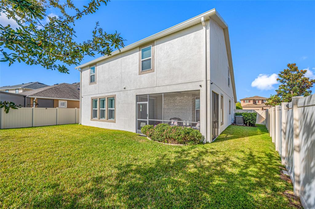 19709 Long Lake Ranch Boulevard Lutz, FL 33558 - Photo 47 of 59 a view of a house with backyard and garden
