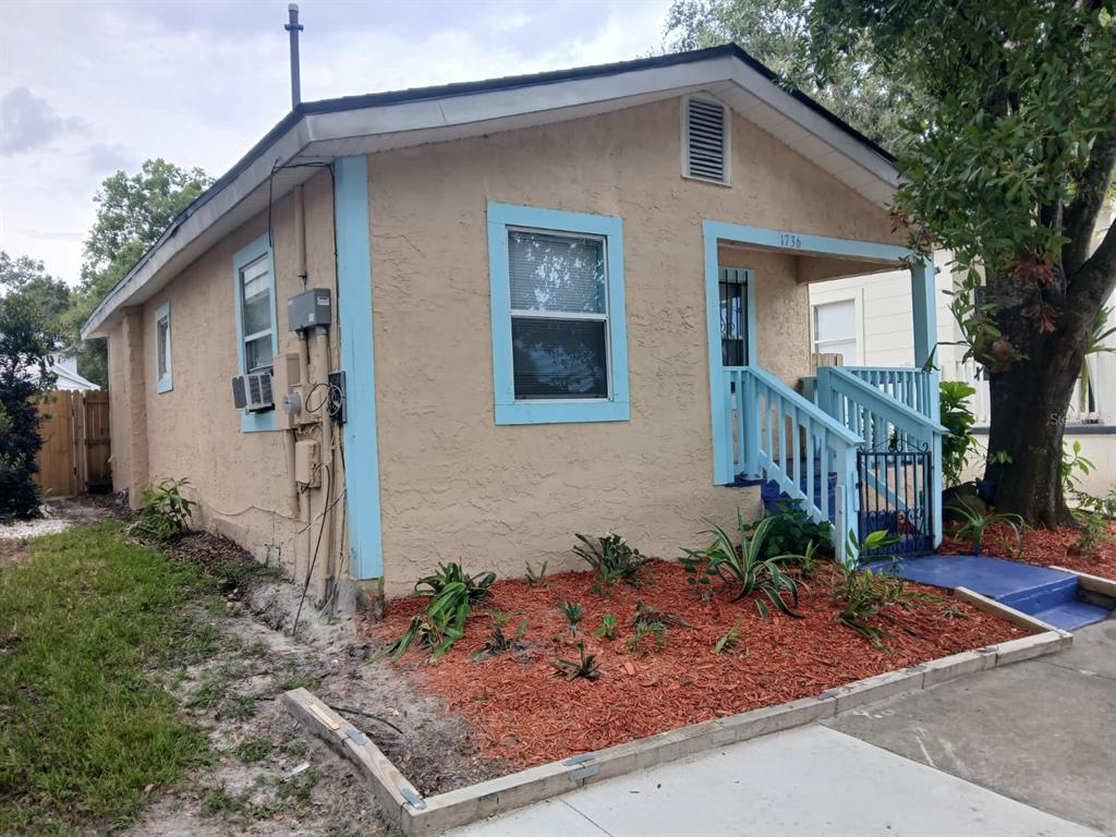 1736 West Cherry Street Tampa, FL 33607 - Photo 1 of 1 a front view of a house with garden