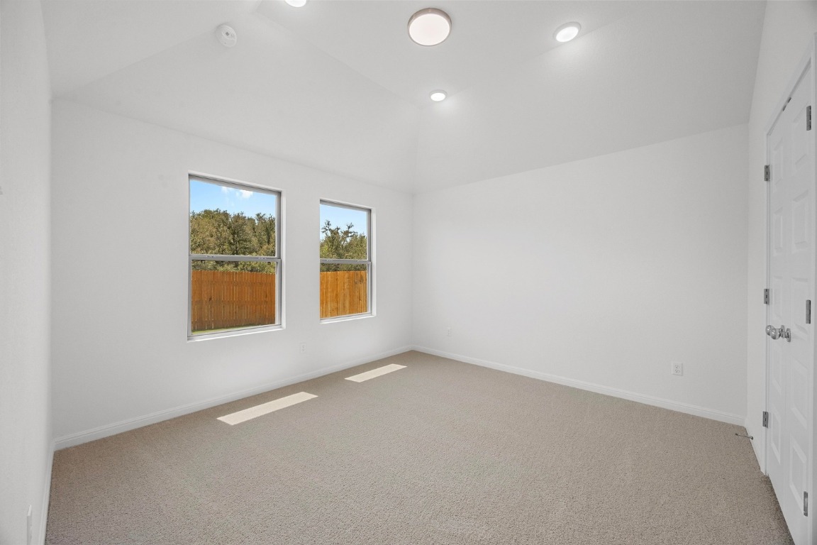 437 Lucky Avenue Elgin, TX 78621 - Photo 11 of 35 an empty room with windows