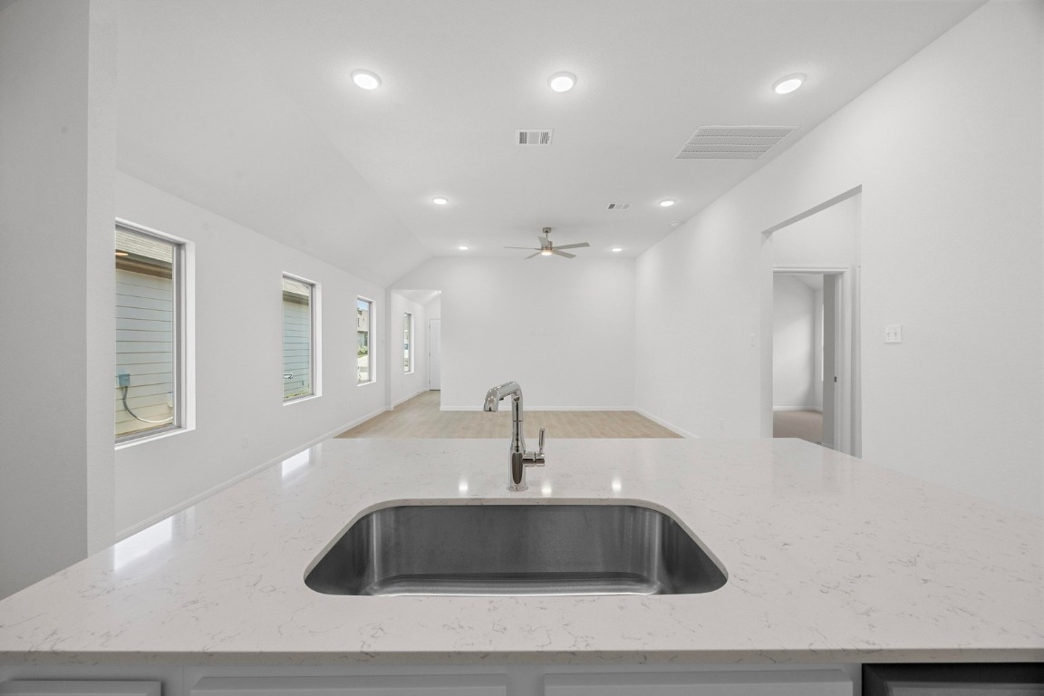 437 Lucky Avenue Elgin, TX 78621 - Photo 5 of 35 a sink sitting next to a bathroom