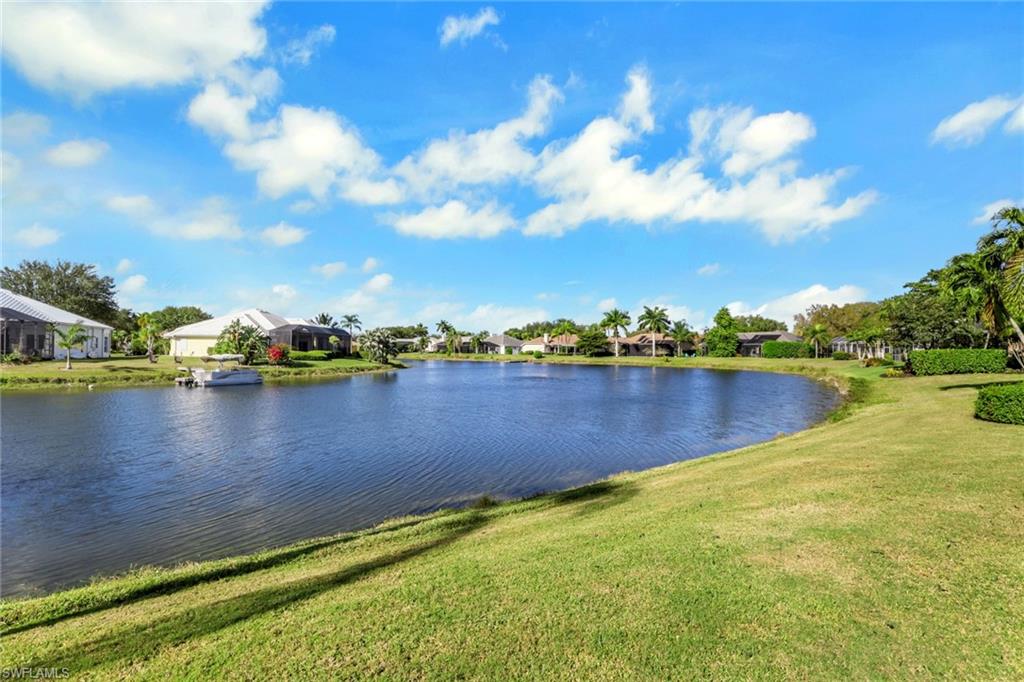 11079 Phoenix Way Naples, FL 34119 - Photo 11 of 30 Water view with nearby suburban area