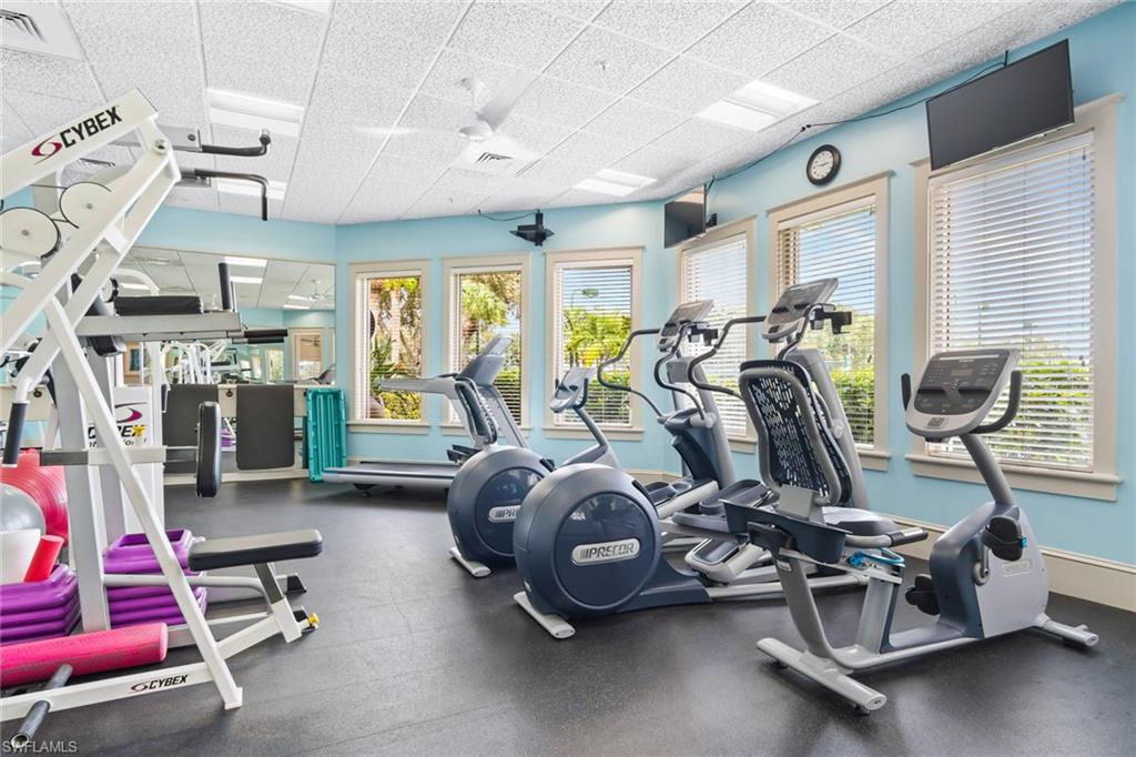 11079 Phoenix Way Naples, FL 34119 - Photo 24 of 30 Workout area featuring a paneled ceiling