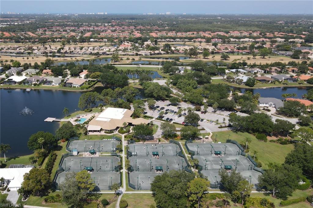 11079 Phoenix Way Naples, FL 34119 - Photo 30 of 30 Aerial view of property's location featuring a nearby body of water and nearby suburban area