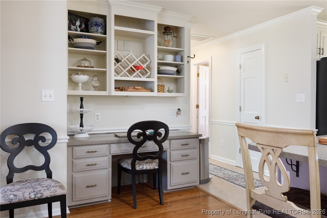 2574 Norrington Road Lillington, NC 27546 - Photo 15 of 50 a view of a livingroom with furniture and closet with wooden floor