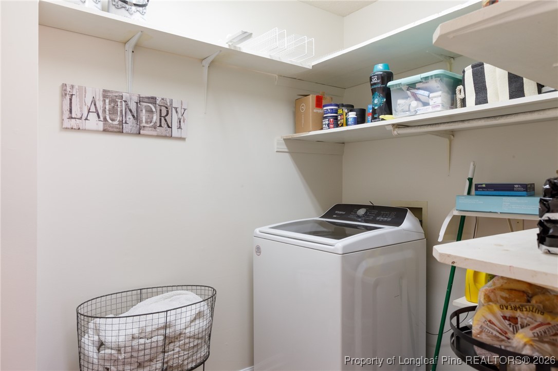 2574 Norrington Road Lillington, NC 27546 - Photo 17 of 50 a utility room with dryer and washer
