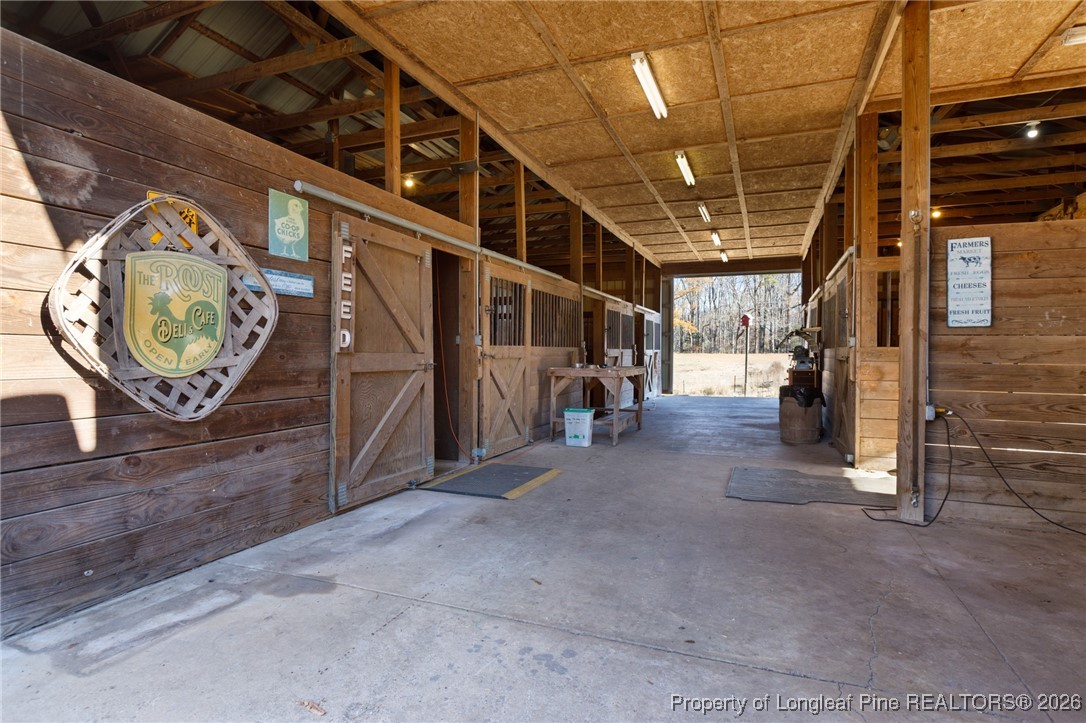 2574 Norrington Road Lillington, NC 27546 - Photo 37 of 50 a view of an empty room with wooden floor
