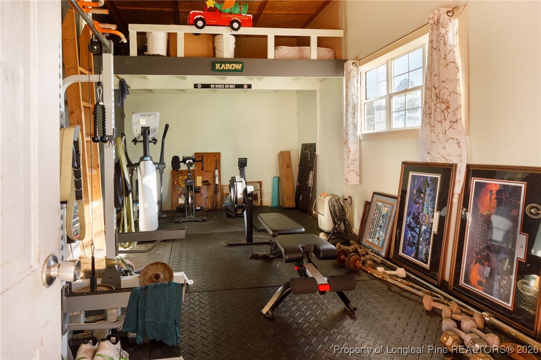 2574 Norrington Road Lillington, NC 27546 - Photo 43 of 50 a view of a room with gym equipment