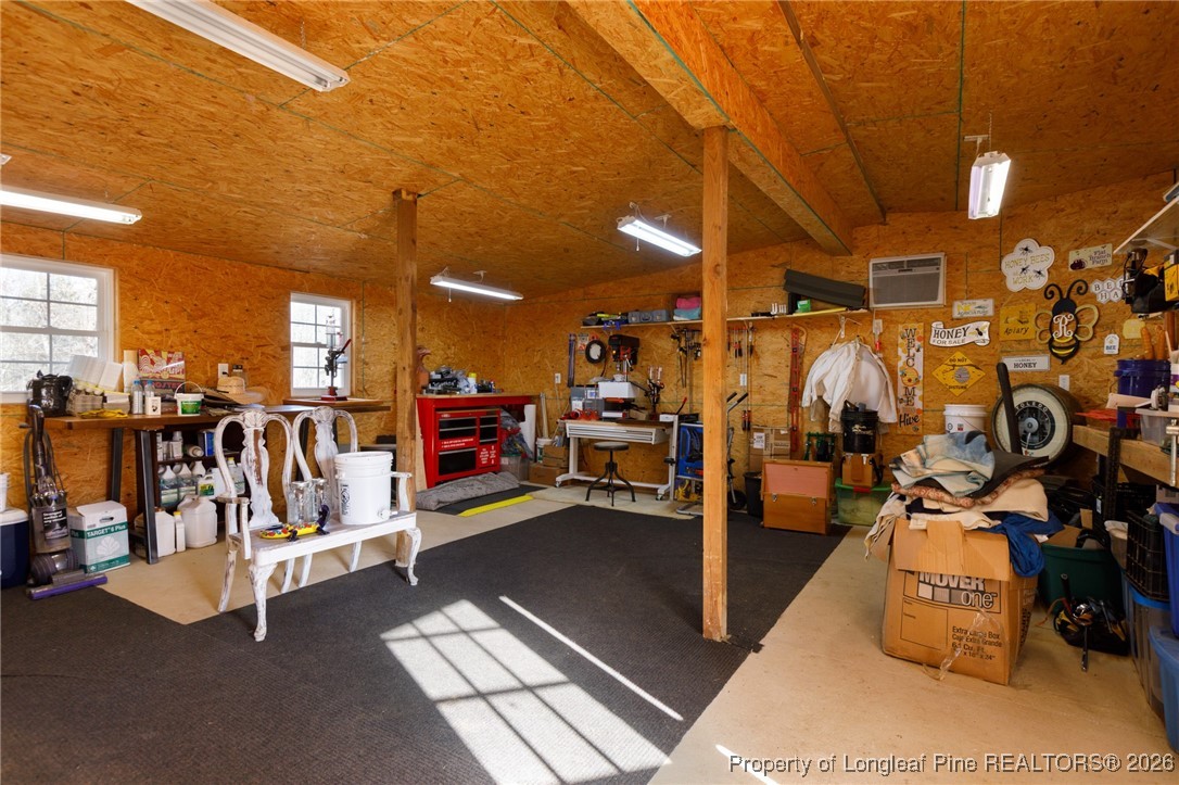2574 Norrington Road Lillington, NC 27546 - Photo 45 of 50 a view of a room with gym equipment