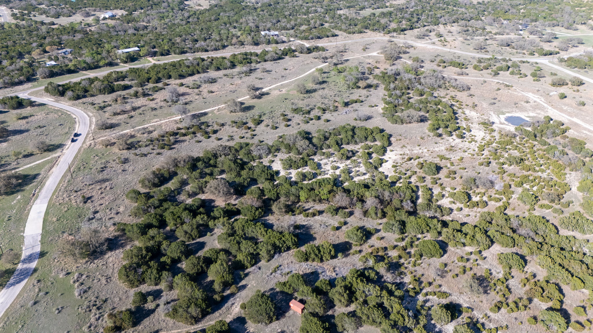 Lot 78 Bluff View Road Kempner, TX 76539 - Photo 8 of 17 a view of a dry yard with lots of trees