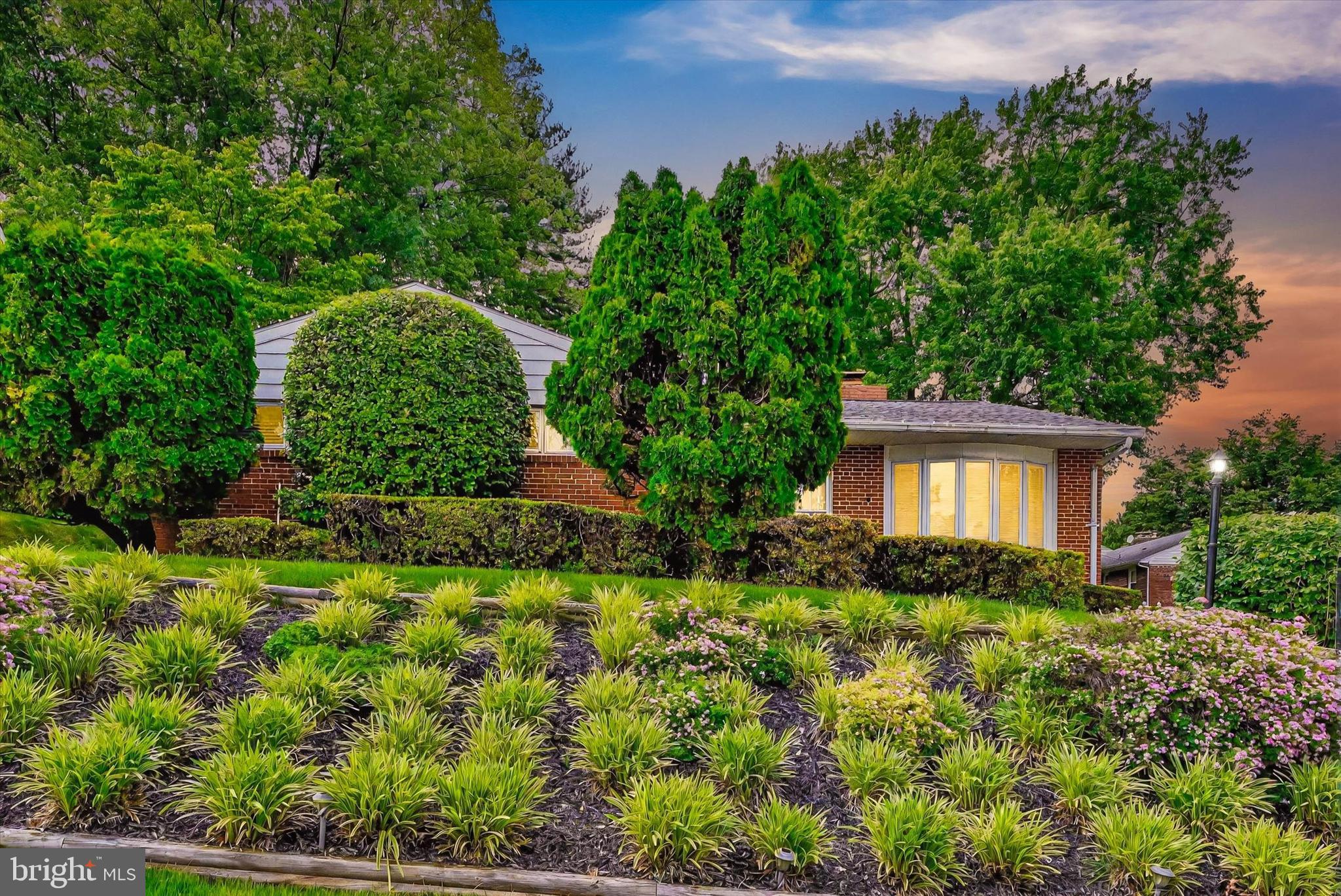 6708 Selkirk Road Baltimore, MD 21239 - Photo 1 of 30 front view of a house with a yard