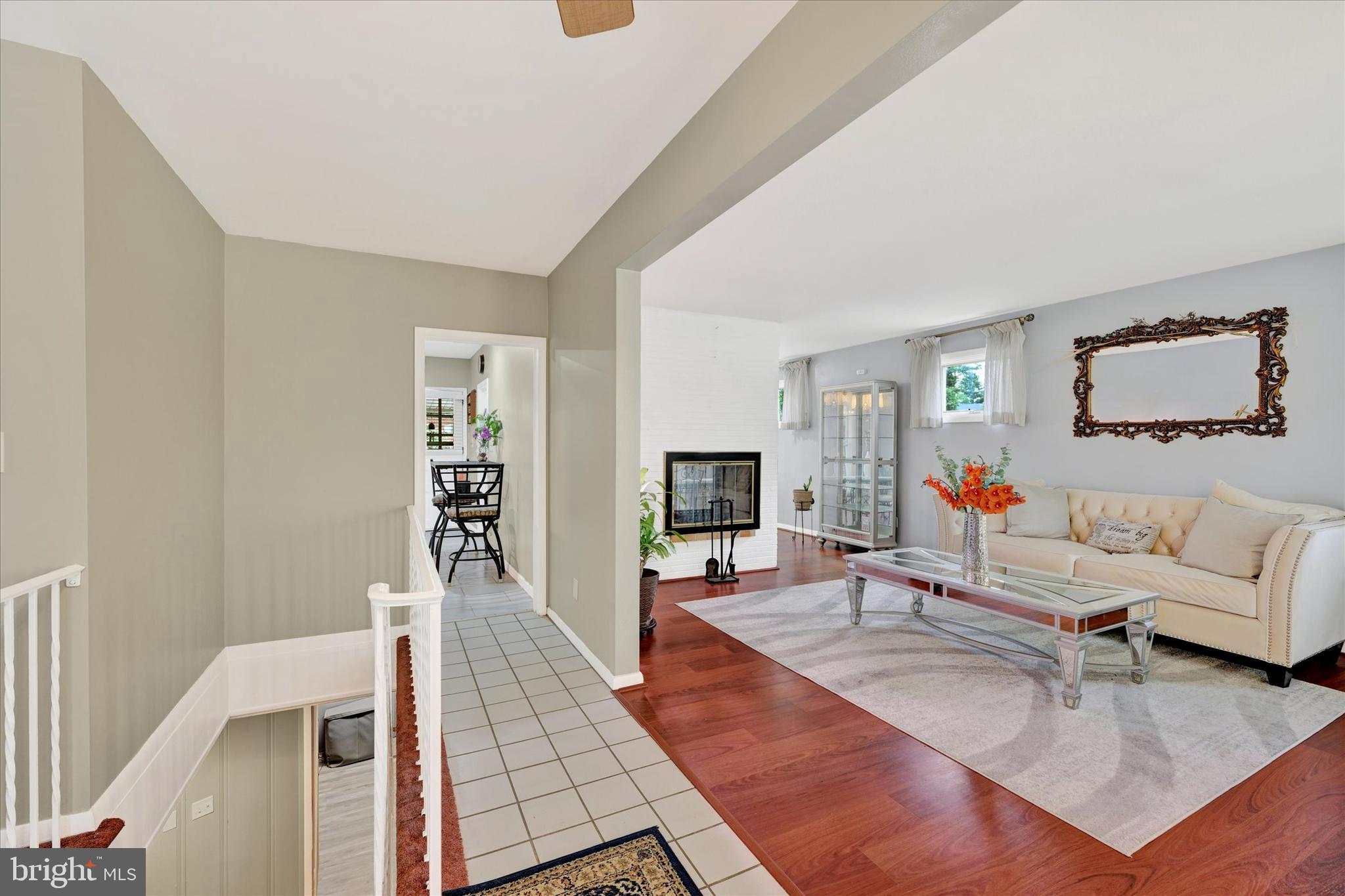 6708 Selkirk Road Baltimore, MD 21239 - Photo 4 of 30 a living room with furniture and a flat screen tv