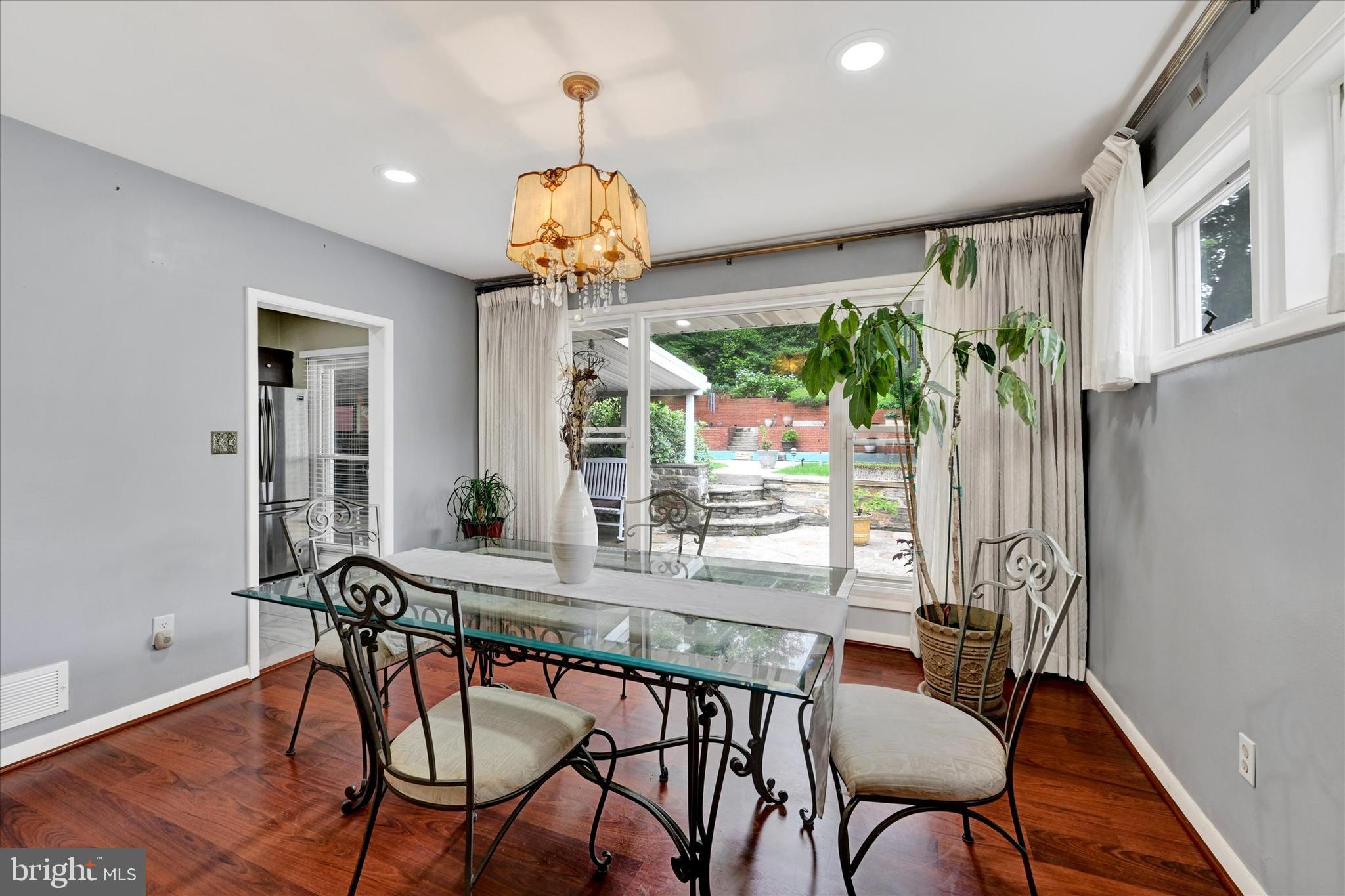 6708 Selkirk Road Baltimore, MD 21239 - Photo 10 of 30 a view of a dining room with furniture window and outside view