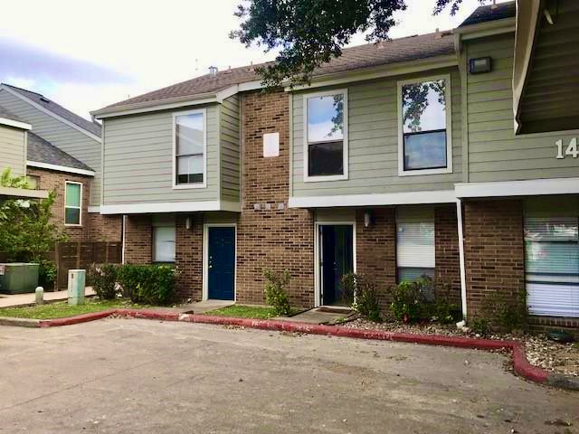 2018 West Rundberg Lane, Unit 14B Austin, TX 78758 - Photo 1 of 1 a front view of a house with a yard
