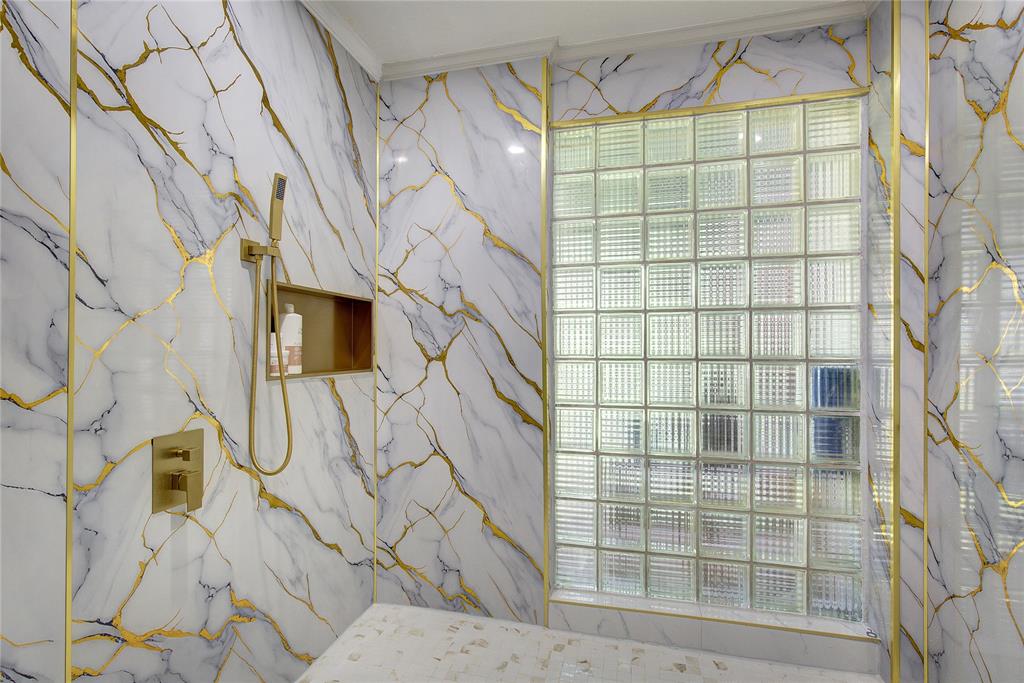 504 Summit Circle Heath, TX 75032 - Photo 21 of 39 a bathroom with a shower