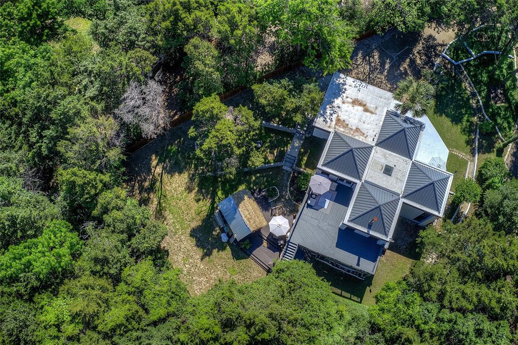 504 Summit Circle Heath, TX 75032 - Photo 26 of 39 an aerial view of a house with yard and outdoor seating