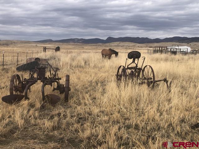 Tract 3 East Oak Grove Road Montrose, CO 81401 - Photo 16 of 18 a view of a lake with a lake in the background