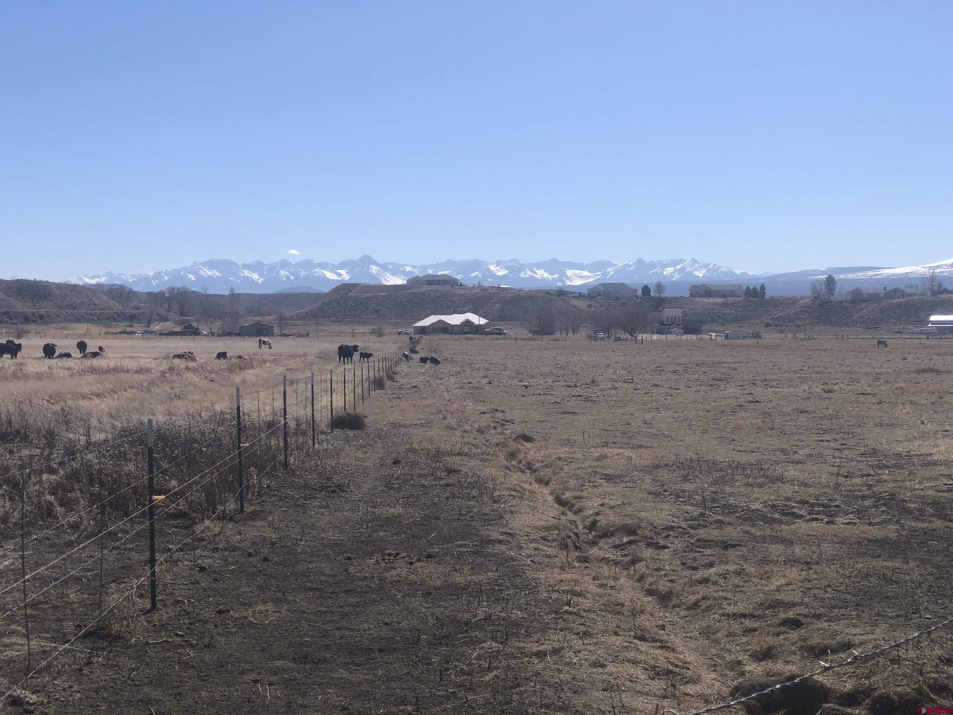Tract 3 East Oak Grove Road Montrose, CO 81401 - Photo 4 of 18 a view of an outdoor space and mountain view