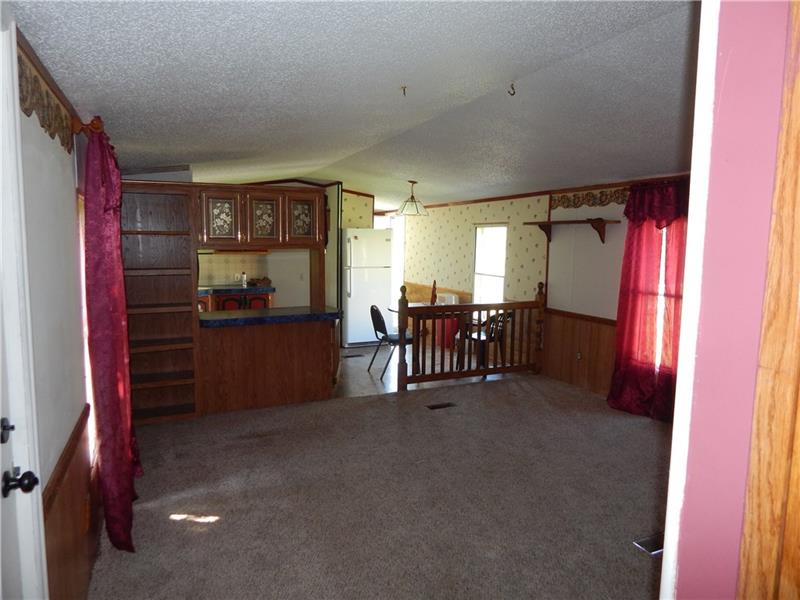 3029 Oneida Valley Road Hilliards, PA 16040 - Photo 5 of 21 LARGE LIVING ROOM WITH EAT IN KITCHEN