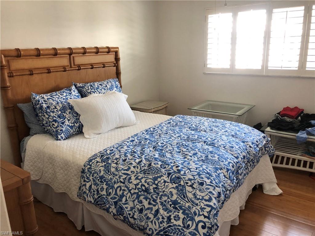 4150 Crayton Road, Unit B8 Naples, FL 34103 - Photo 15 of 25 Secondary bedroom, King bedroom with large closet and storage area