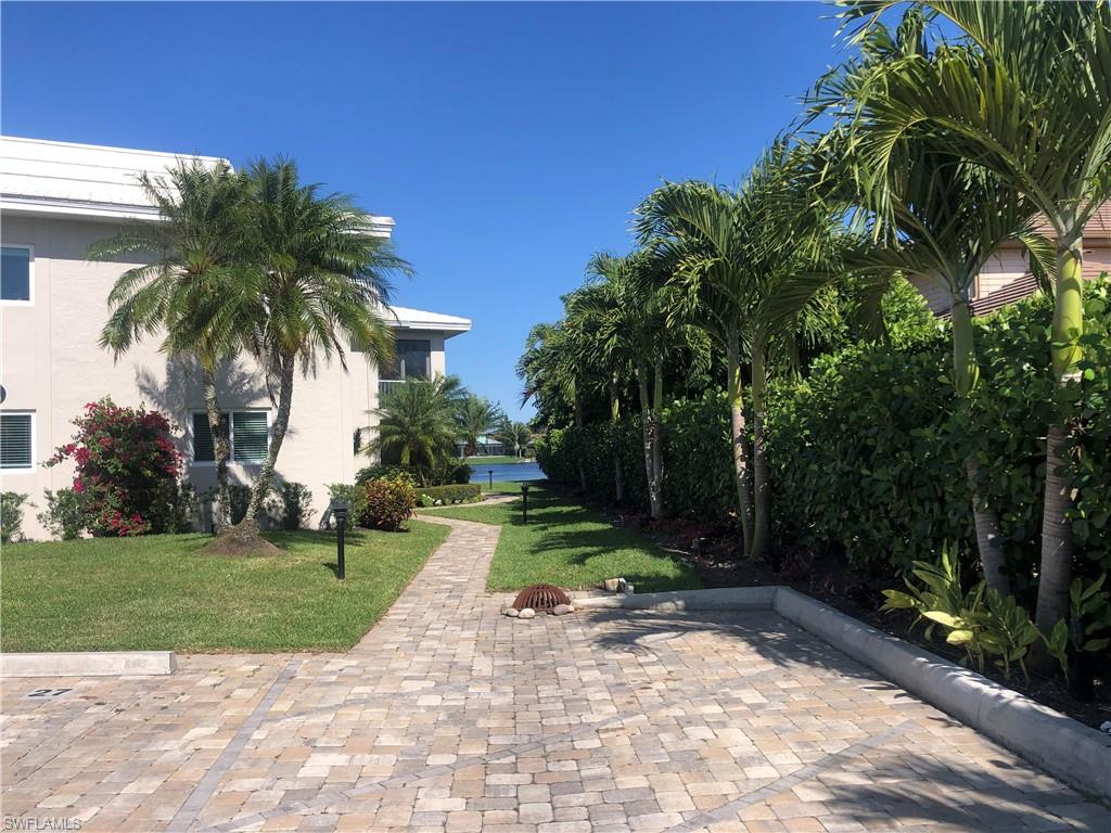 4150 Crayton Road, Unit B8 Naples, FL 34103 - Photo 23 of 25 Driveway to the building