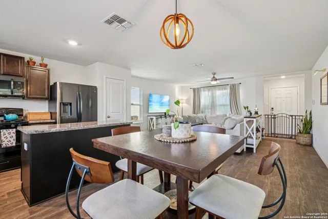 a view of a dining room with furniture