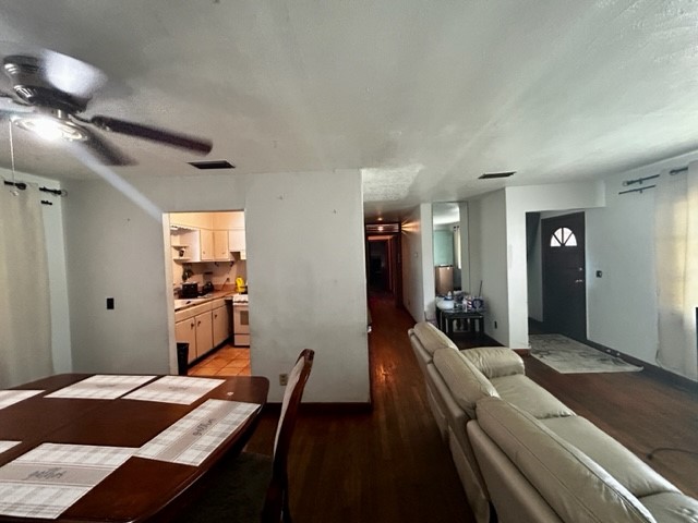 602 South 11th Street Fernandina Beach, FL 32034 - Photo 6 of 14 a large white room with a large mirror and furniture