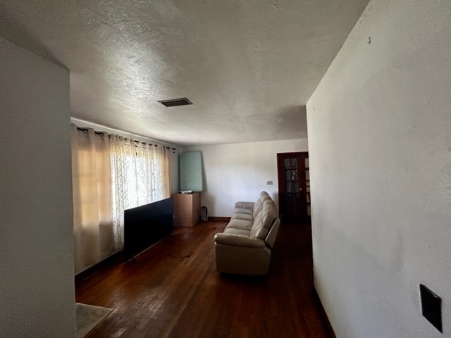 602 South 11th Street Fernandina Beach, FL 32034 - Photo 8 of 14 a living room with furniture and a window