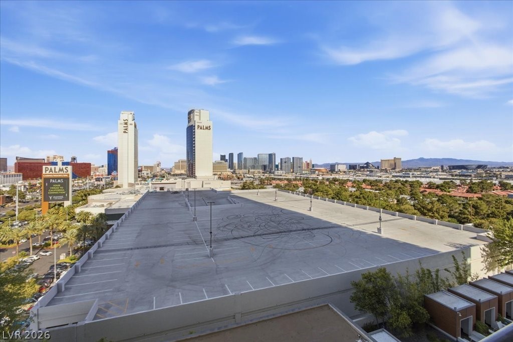 4381 West Flamingo Road, Unit 10306 Las Vegas, NV 89103 - Photo 19 of 26 This elevated view captures the cityscape, offering a broad perspective of the vibrant urban environment.