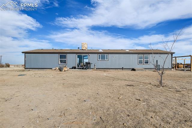 39301 Jacobson Road Rush, CO 80833 - Photo 37 of 40 10x10 Concrete patio overs exterior electrical hook up for Hot Tub