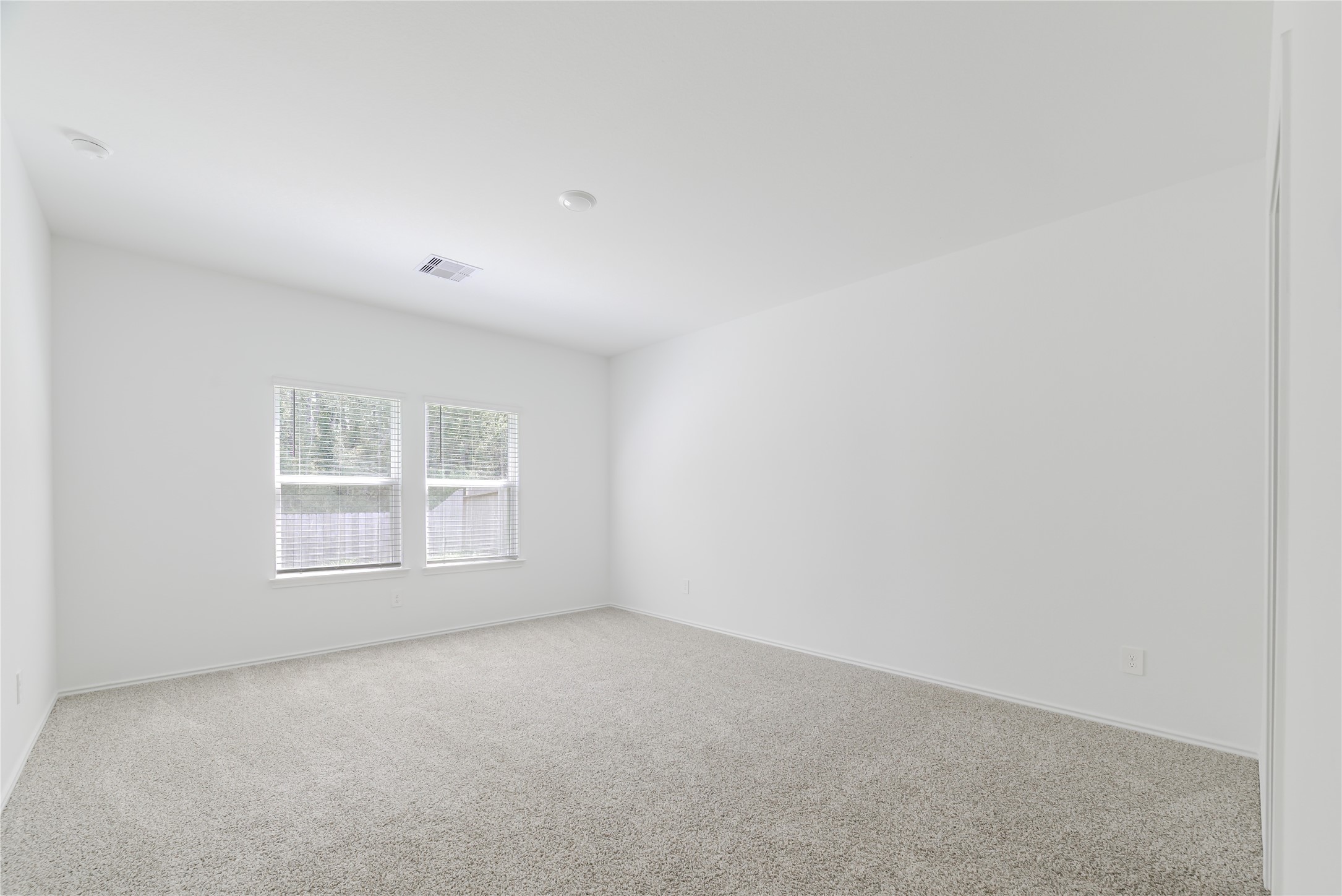 5619 Simcrest Grove Dr Spring Spring, TX 77373 - Photo 15 of 35 an empty room with a window