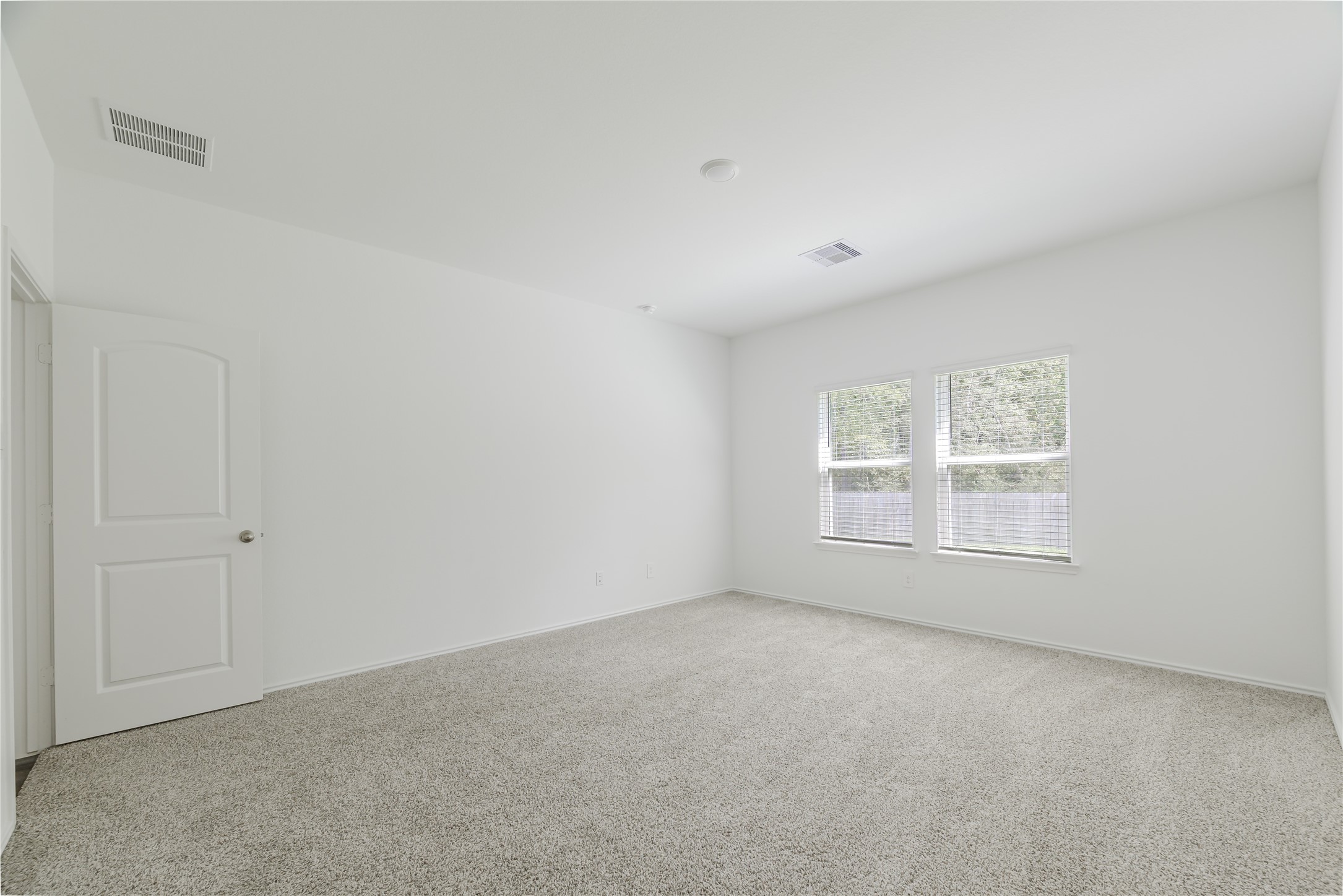 5619 Simcrest Grove Dr Spring Spring, TX 77373 - Photo 18 of 35 an empty room with a window